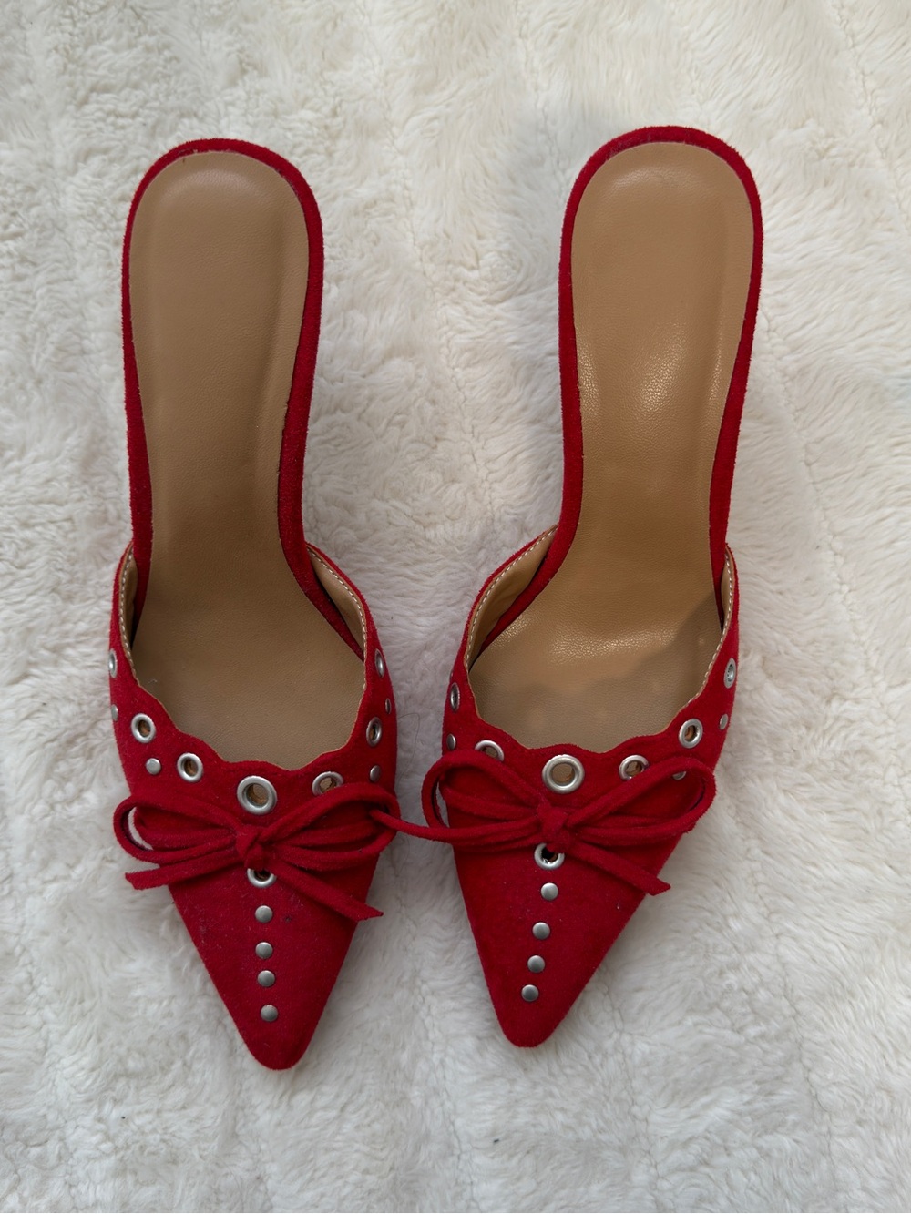 Red Pointed-Toe Slip-On Heels with Eyelet and Bow Detail